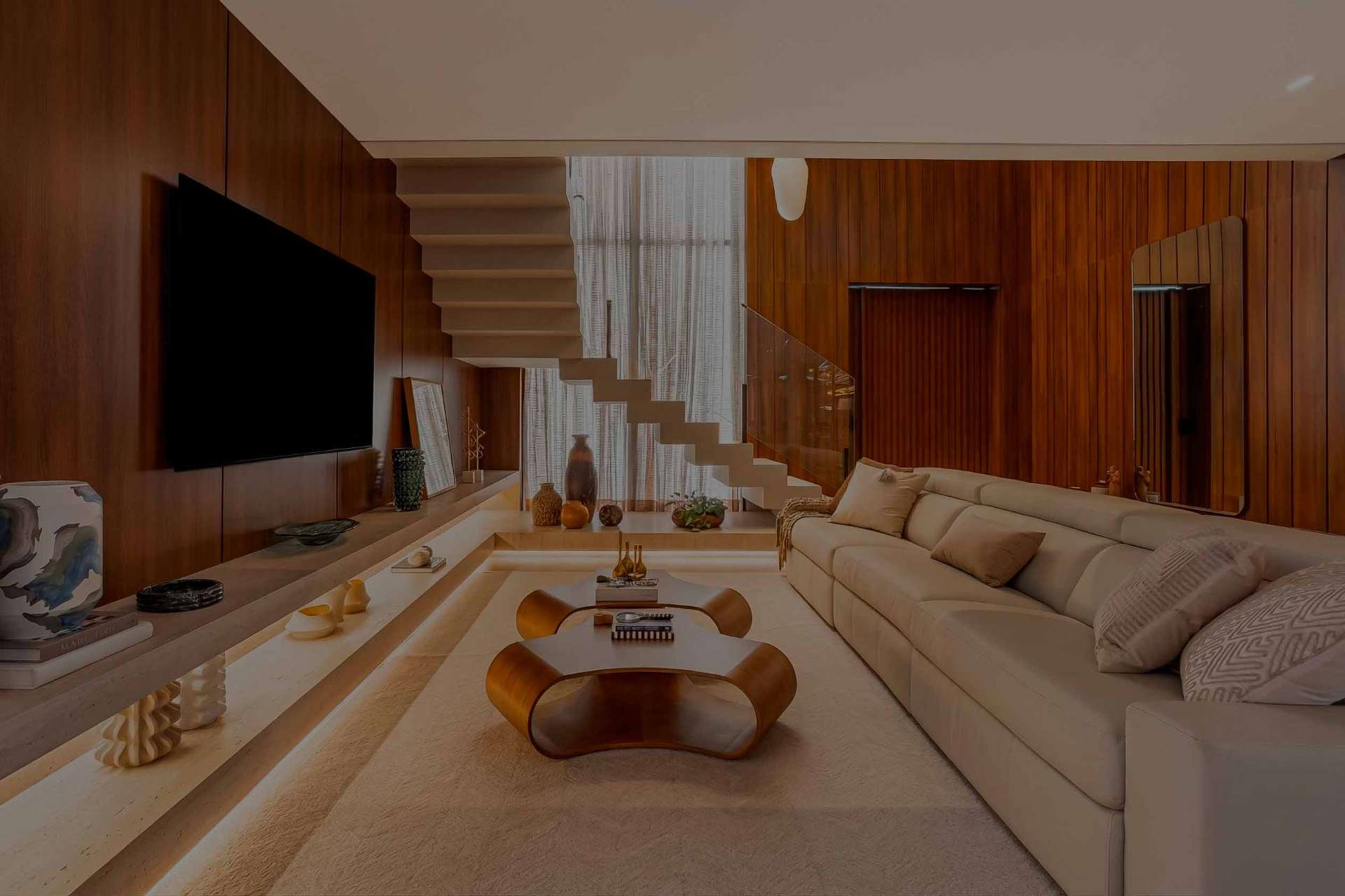 Living contemporâneo Afectto, com mobiliário e acabamentos naturais